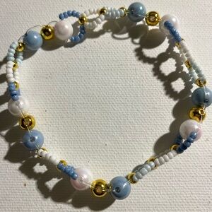 Elegant Beaded Bracelet with Gold Accents